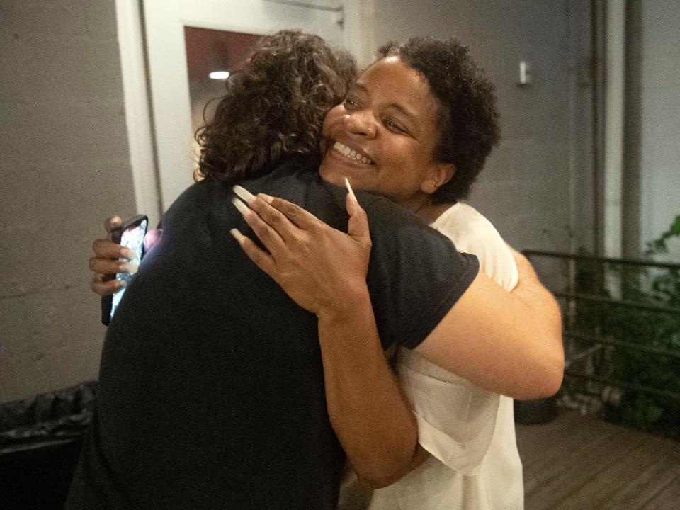 Amelia Parker is congratulated by a supporter after arriving at her election night watch party at the Public House on Aug. 29 in Knoxville. She will receive the National Homelessness Law Center's nonpartisan Local Legislator Award at the Human Right to Housing Awards for her leadership to decriminalize homelessness and promote solutions informed by her unhoused constituents.