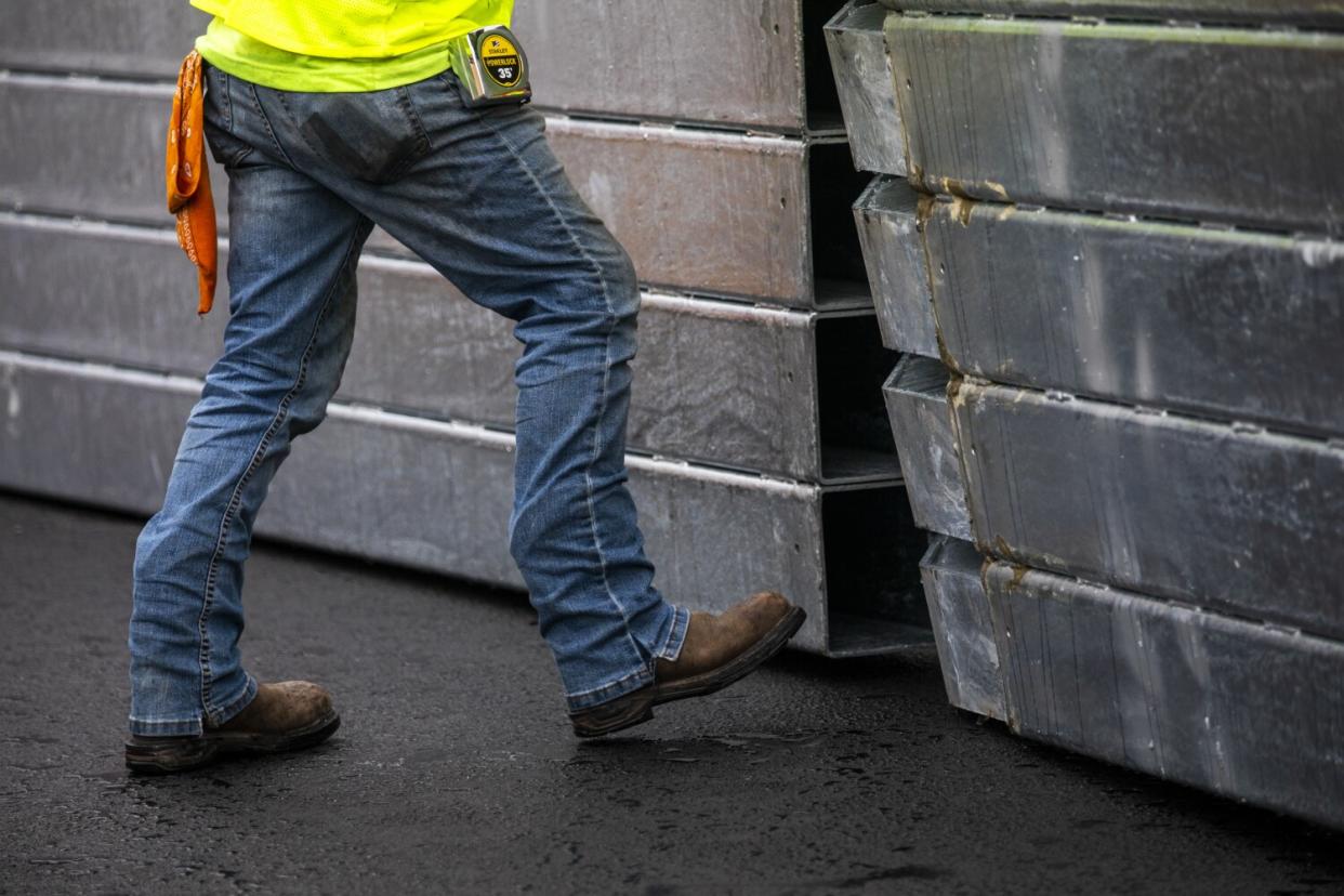 Earl Creach prepares sections of the SAFER barrier that will be installed around the race track.