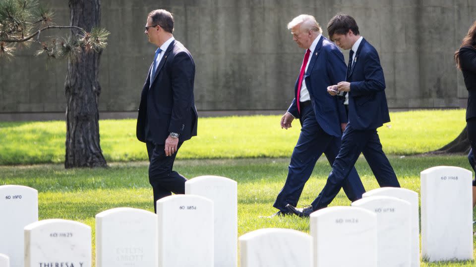 Former President Donald Trump leaves Section 60 of Arlington National Cemetery on August 26, 2024. - Kevin Carter/Getty Images/File