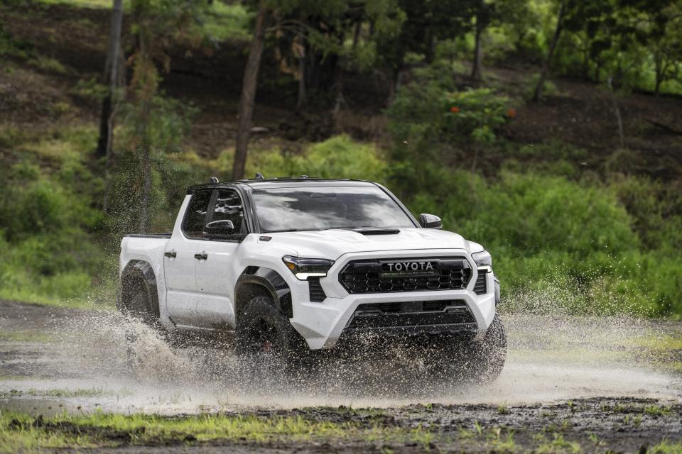 This photo provided by Toyota shows the redesigned 2024 Tacoma pickup truck. Significant upgrades include new styling, more power, and more of the latest technology features. (Toyota Motor Sales U.S.A. via AP)