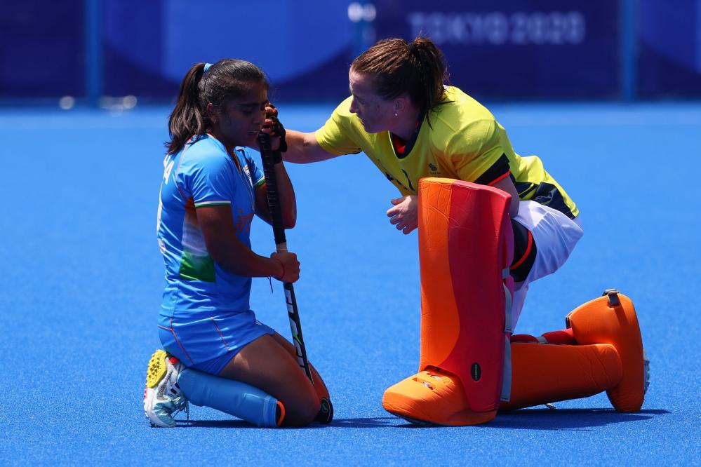 Indian women's hockey team finishes 4th at Olympics after losing to Great  Britain; See match pics!