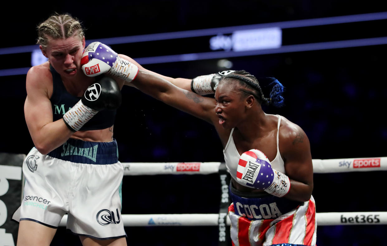 LONDON, ENGLAND - OCTOBER 15: Claressa Shields (R) punches Savannah Marshall (L) during the IBF, WBA, WBC, WBO World Middleweight Title fight between Claressa Shields and Savannah Marshall on the Shields vs Marshall Boxxer fight night which is the first women's only boxing card in the UK at The O2 Arena on October 15, 2022 in London, England. (Photo by James Chance/Getty Images)