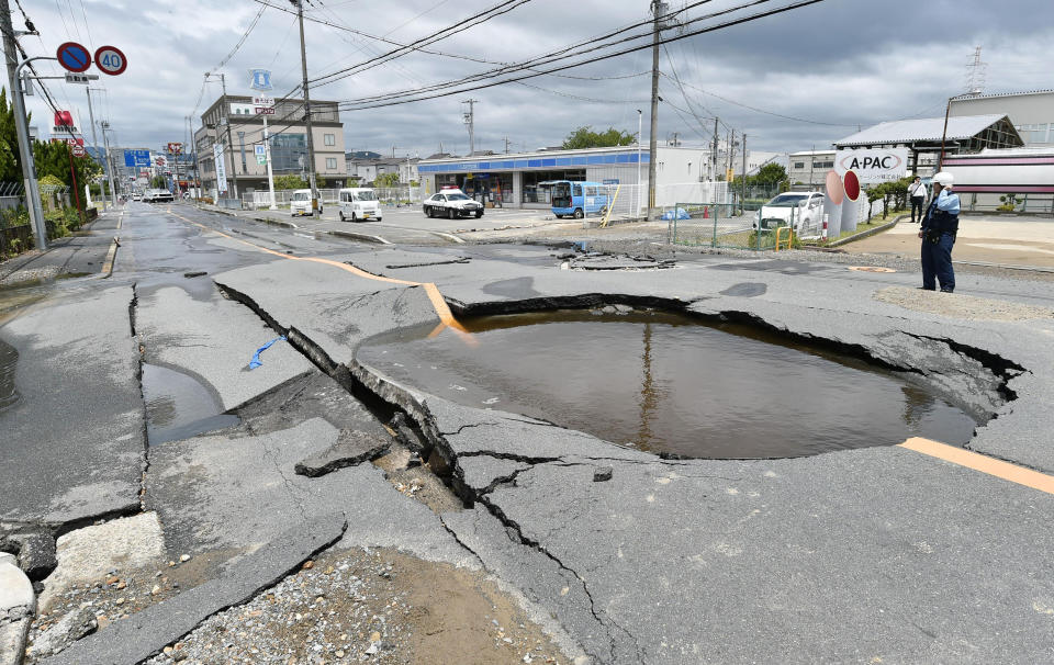 <p>Debris of damaged walls are scattered following an earthquake, in Ibaraki, Osaka, Monday, June 18, 2018. (Photo: Yosuke Mizuno/Kyodo News via AP) </p>