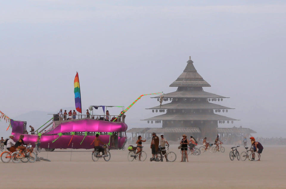 <p>An art car and the Temple Project are visible on the Playa as approximately 70,000 people from all over the world gather for the 30th annual Burning Man arts and music festival in the Black Rock Desert of Nevada, Aug. 29, 2016. (REUTERS/Jim Urquhart)</p>