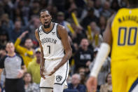 Brooklyn Nets forward Kevin Durant (7) reacts after being called for a technical foul during the second half of an NBA basketball game against the Indiana Pacers in Indianapolis, Friday, Nov. 25, 2022. (AP Photo/Doug McSchooler)