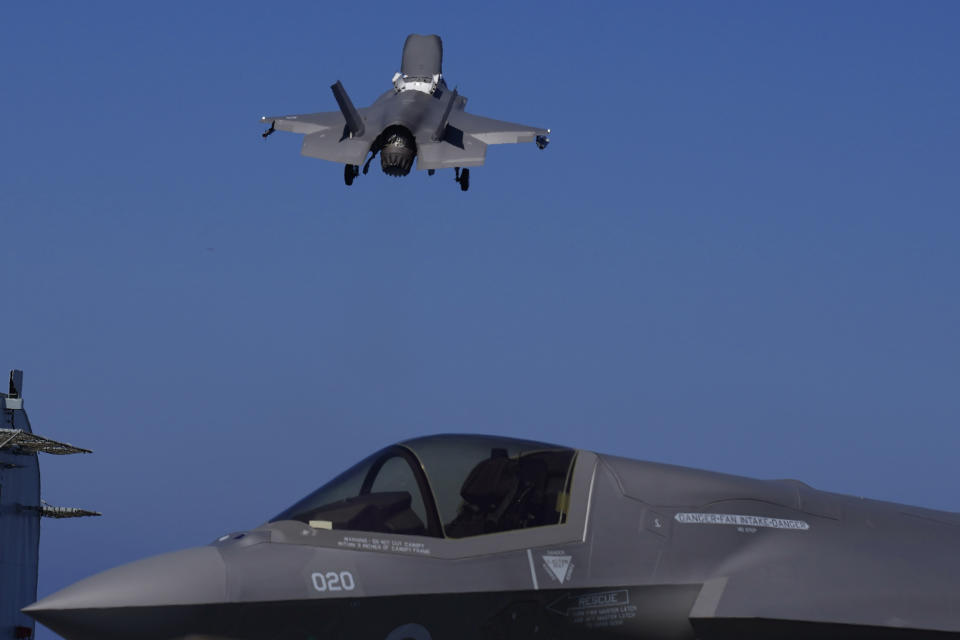 F-35 aircraft takes off from the U.K.'s aircraft carrier HMS Queen Elizabeth in the Mediterranean Sea on Sunday, June 20, 2021. The British Royal Navy commanders say the U.K.'s newest aircraft carrier HMS Queen Elizabeth is helping to take on the "lion's share" of operations against the Islamic State group in Iraq as Russian warplanes get an up-close look at the cutting-edge F-35 jet in a "cat-and-mouse" game with British and U.S. pilots. (AP Photo/Petros Karadjias)