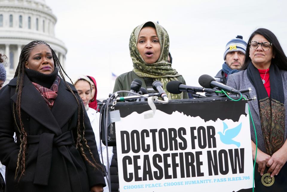 Congresswomen Cori Bush (D-MO), left, Rashida Tlaib (D-MI), right, and Ilhan Omar (D-MN), center, speaking at a press conference on Dec. 7, 2023 in Washington, D.C calling for a ceasefire in Gaza.