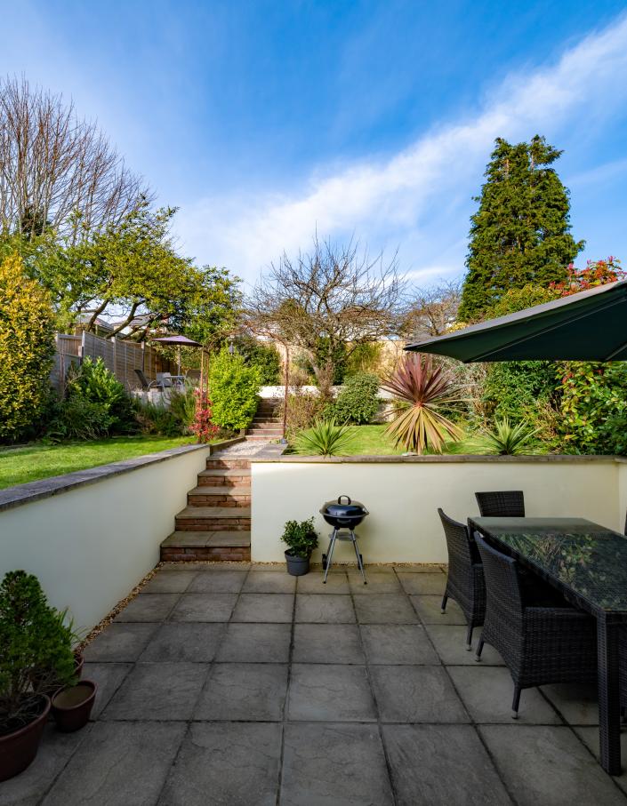 Dining al fresco enhances the backyard experience.