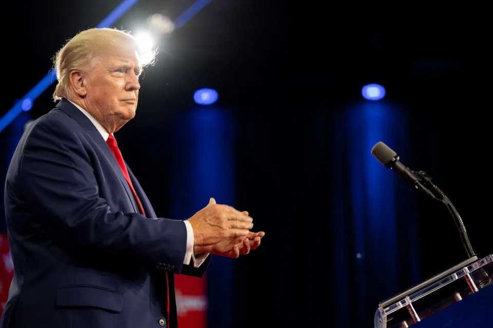 Former U.S. President Donald Trump applauds upon arrival at the Conservative Political Action Conference (CPAC) at the Hilton Anatole on August 06, 2022 in Dallas, Texas.