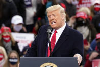 President Donald Trump speaks during a campaign rally at Manchester-Boston Regional Airport, Sunday, Oct. 25, 2020, in Londonderry, N.H. (AP Photo/Elise Amendola)