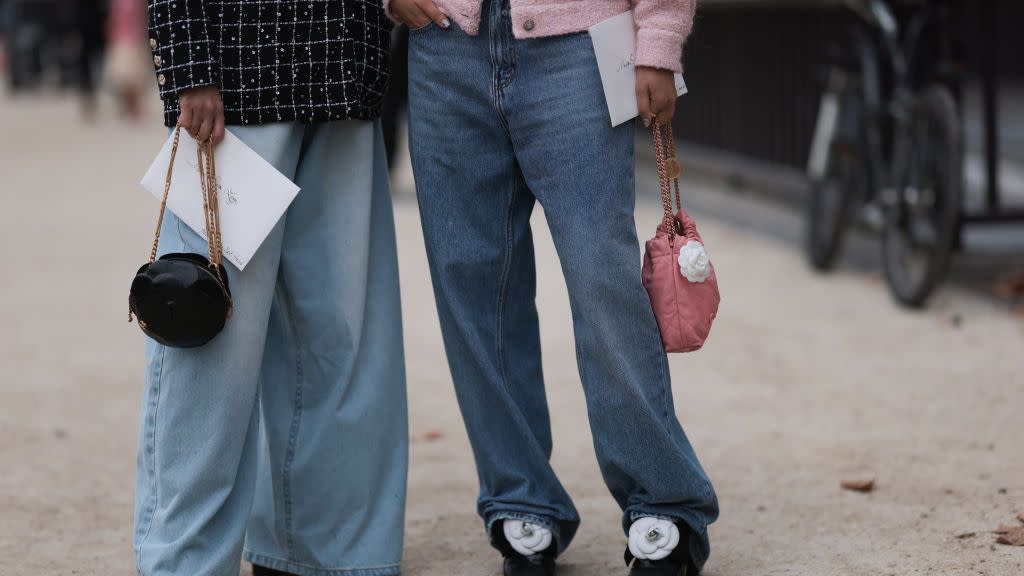 two women wear jeans to illustrate a guide to the best jeans for women 2023