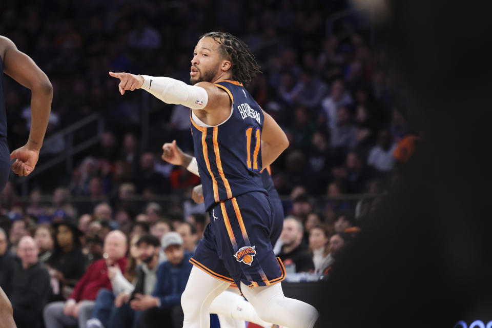 New York Knicks guard Jalen Brunson (11) gestures during the first half of an NBA basketball game against the Phoenix Suns, Monday, Jan. 2, 2023, in New York. (AP Photo/Jessie Alcheh)