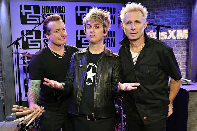 <p>Cindy Ord/Getty</p> Tré Cool, Billie Joe Armstrong and Mike Dirnt of Green Day in New York City on Jan. 17, 2024