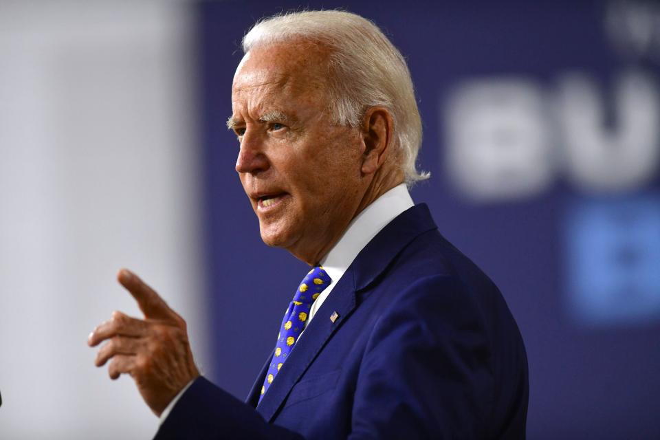 Former Vice President Joe Biden's massive ad blitz aims to present him to voters as a unifying leader equipped to steer the country through crisis. (Mark Makela/Getty Images)