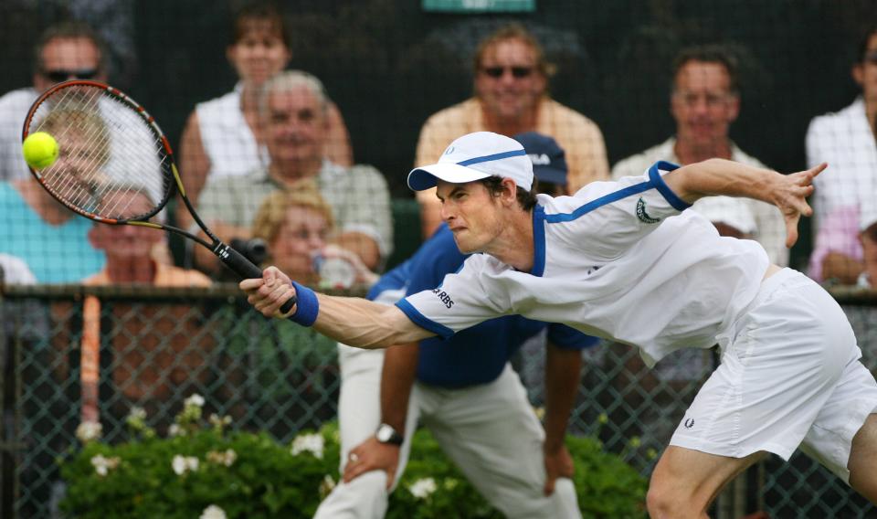 Andy Murray, of Britain, stretches to return a volley during his match against Justin Gimelstob, of the USA, during their match in 2006.