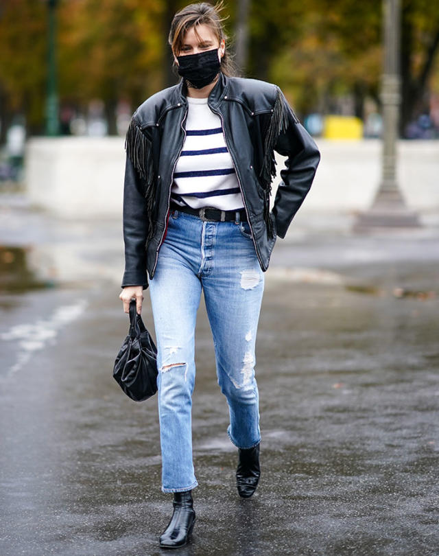 black cropped jeans, a white shirt, a tan jacket and leopard shoes