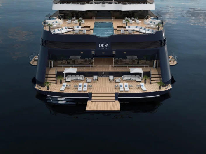 A rendering of aft on the Ritz-Carlton Evrima as it sits on the ocean.