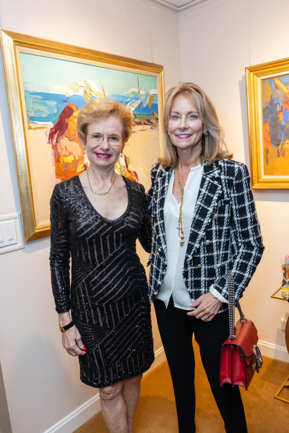 Caroline Harless and Linda Olsson at the Findlay Galleries this month before the Palm Beach Symphony gala.