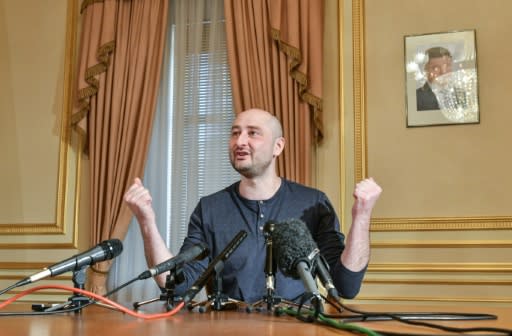 Anti-Kremlin Russian reporter Arkady Babchenko defends against criticism from fellow journalists over faking his own murder. Source: AFP