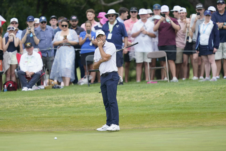 Scottie Scheffler reacts after missing his putt on the 10th hole during the final round of the Byron Nelson golf tournament in McKinney, Texas, Sunday, May 14, 2023. (AP Photo/LM Otero)