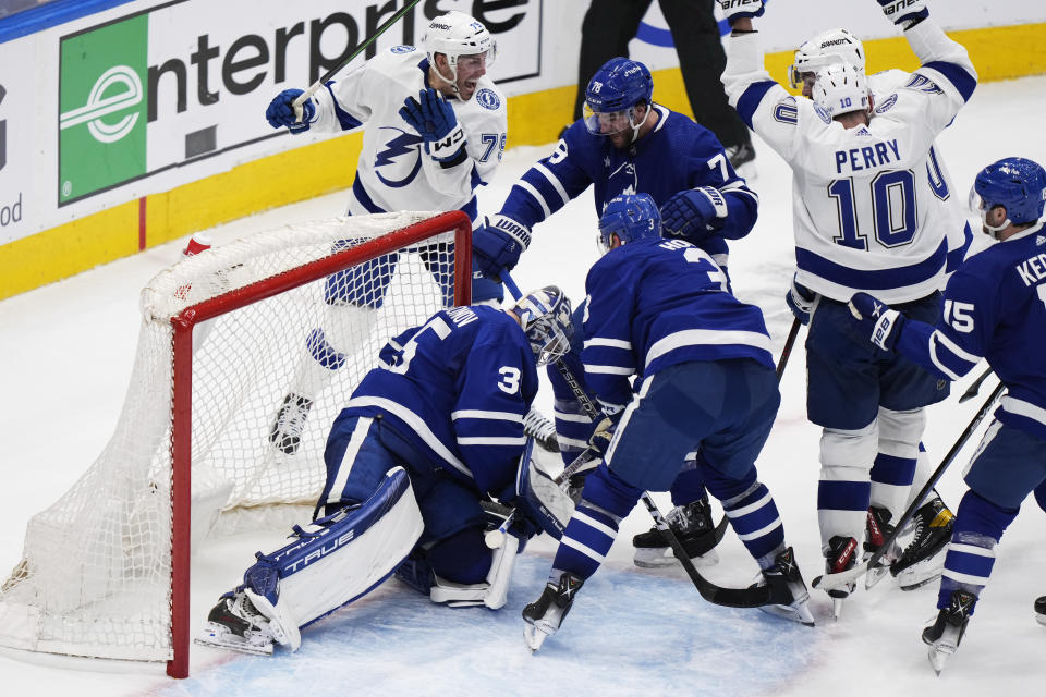 Tampa Bay Lightning right wing Corey Perry (10) scores on Toronto Maple Leafs goaltender Ilya Samsonov (35) during the second period of Game 1 of a first-round NHL hockey playoff series Tuesday, April 18, 2023, in Toronto. (Frank Gunn/The Canadian Press via AP)