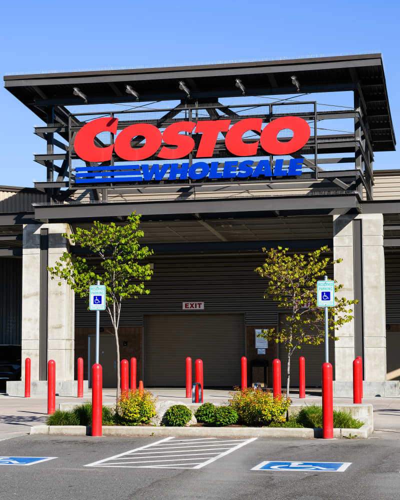 Redmond, WA, USA - May 16, 2021; Entrance to Costco Wholesale store before opening hours with no people in Redmond Washington State