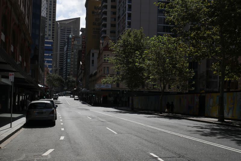 An almost empty street is seen during a workday following the implementation of stricter social-distancing and self-isolation rules to limit the spread of the coronavirus disease (COVID-19) in Sydney