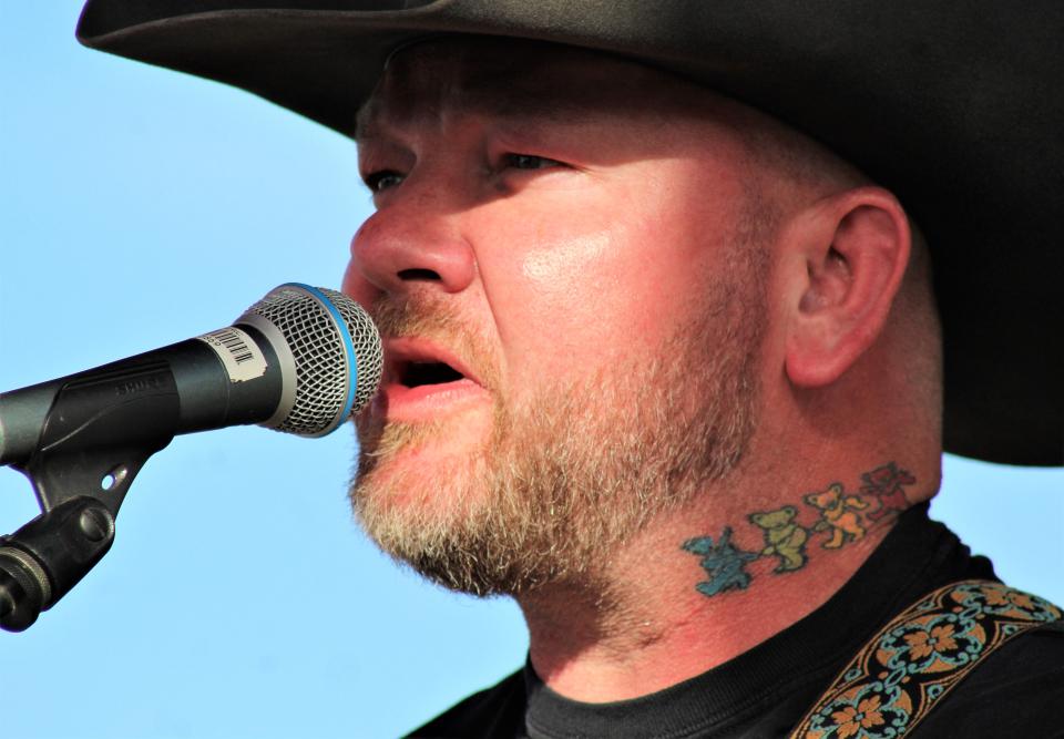 The early sun strikes Stoney LaRue during his show at Outlaws and Legends Musical Festival in Abilene Saturday, April 1, 2023.