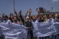 Kashmiri traders shout Islamic slogans during a protest against Nupur Sharma, a spokesperson of governing Hindu nationalist party over her remarks about Prophet Mohammed, during a protest in Srinagar, Indian controlled Kashmir, Friday, June 10, 2022. In Indian-controlled Kashmir, authorities locked down two towns on Friday and snapped internet on mobile phones in several towns and in Srinagar, the disputed region’s main city, fearing anger against the insulting remarks to Islam could morph into larger, anti-India protests. (AP Photo/Dar Yasin)