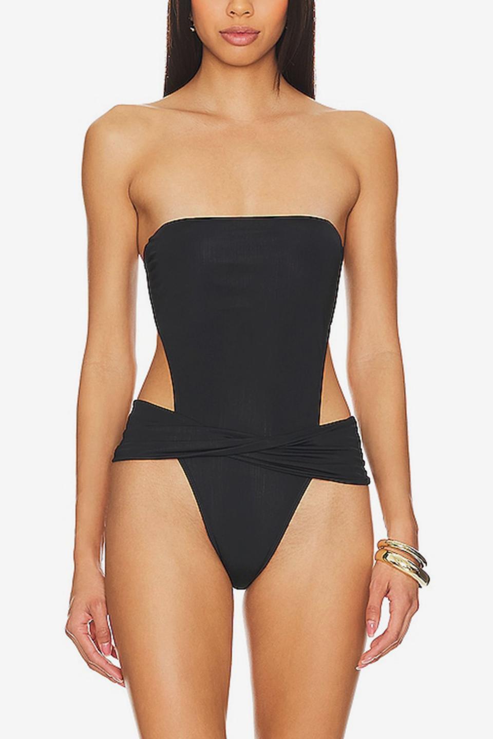 <p><a href="https://go.redirectingat.com?id=74968X1596630&url=https%3A%2F%2Fwww.revolve.com%2Fvix-swimwear-kieza-one-piece-in-black%2Fdp%2FVIXS-WX1226%2F%3Fd%3DWomens%26page%3D1%26lc%3D2%26itrownum%3D1%26itcurrpage%3D1%26itview%3D05&sref=https%3A%2F%2Fwww.elle.com%2Ffashion%2Fshopping%2Fg60212808%2Fbest-cut-out-one-piece-swimsuits%2F" rel="nofollow noopener" target="_blank" data-ylk="slk:Shop Now;elm:context_link;itc:0;sec:content-canvas" class="link ">Shop Now</a></p><p>Kieza One-Piece</p><p>revolve.com</p><p>$248.00</p>