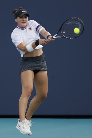 Mar 21, 2019; Miami Gardens, FL, USA; Bianca Andreescu of Canada hits a backhand against Irina-Camelia Begu of Romania (not pictured) in the first round of the Miami Open at Miami Open Tennis Complex. Mandatory Credit: Geoff Burke-USA TODAY Sports