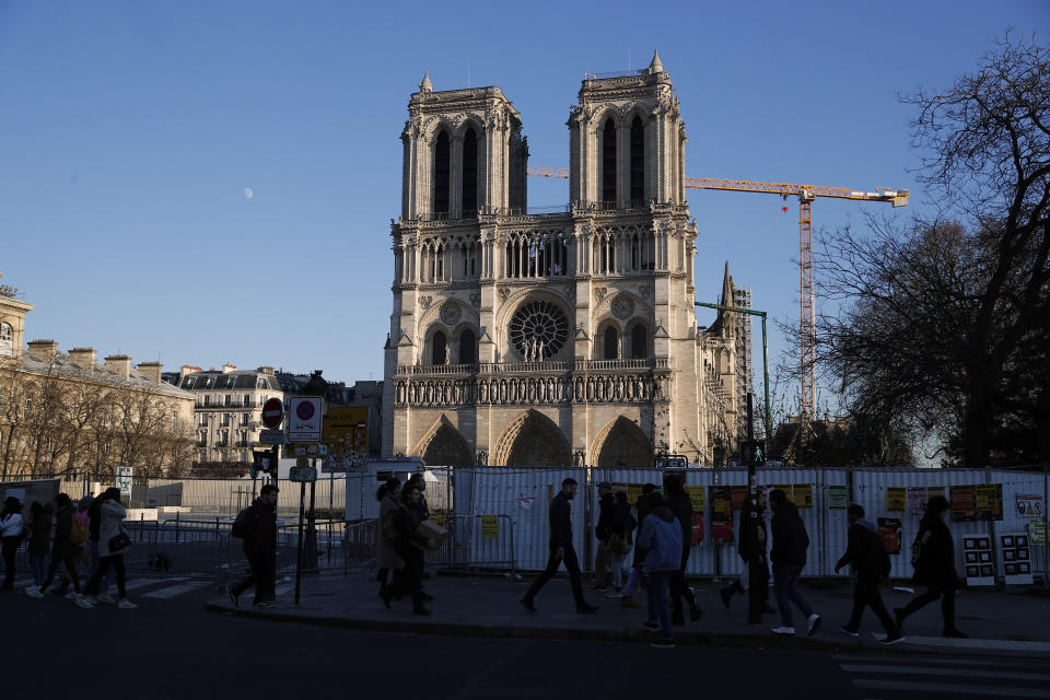 Notre Dame cathedral is pictured in Paris, Monday, Jan. 6, 2020. Gen. Jean-Louis Georgelin who is overseeing the reconstruction of the fire-devastated Notre Dame Cathedral told French broadcaster CNews on Sunday that "the cathedral is still in a state of peril" after last year's fire, which destroyed its roof and collapsed its spire as the cathedral was undergoing renovations. (AP Photo/Francois Mori)