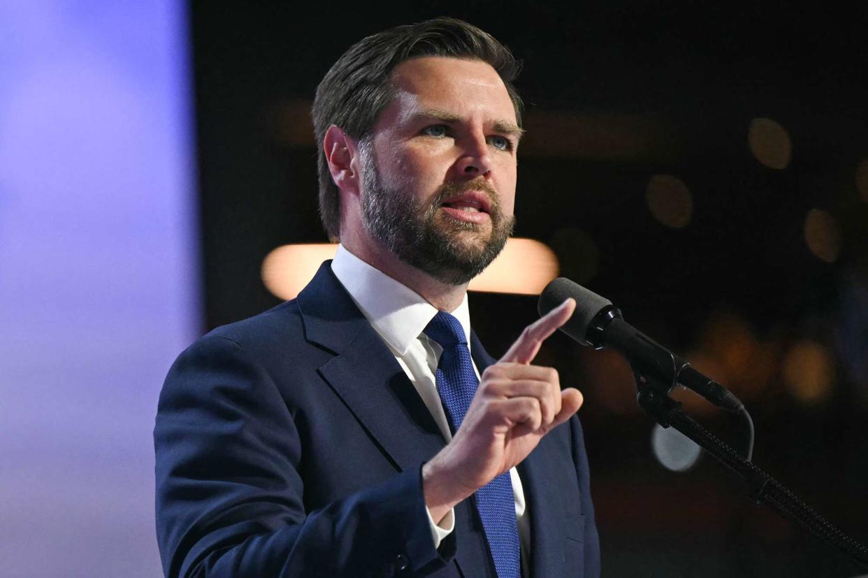 <p>PATRICK T. FALLON/AFP via Getty</p> J.D. Vance at the Republican National Convention in Milwaukee on July 17, 2024