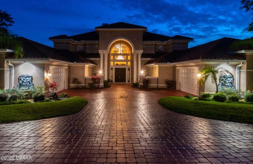 This fabulous Daytona Beach riverfront estate, which has a reduced price of $2,940,000, is tucked inside automatic gates.
