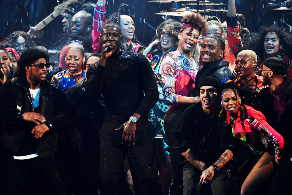 LONDON, ENGLAND - FEBRUARY 18: (EDITORIAL USE ONLY) Stormzy (C) performs during The BRIT Awards 2020 at The O2 Arena on February 18, 2020 in London, England. (Photo by Gareth Cattermole/Getty Images)