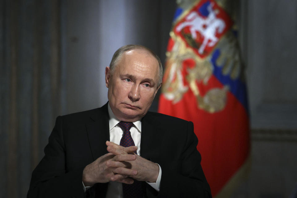 FILE - Russian President Vladimir Putin gestures while speaking during an interview with a Russian state-owned media organization in Moscow, Russia, Tuesday, March 12, 2024. As Vladimir Putin heads for another six-year term as Russia’s president, there’s little electoral drama in the race. What he does after he crosses the finish line, however, is what’s drawing attention and, for many observers, provoking anxiety. (Gavriil Grigorov, Sputnik, Kremlin Pool Photo via AP, File)