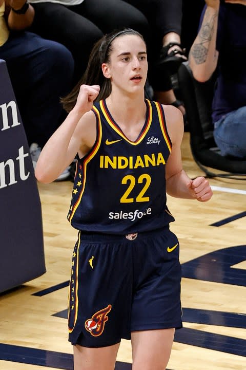 INDIANAPOLIS, IN – MAY 09: Indiana Fever guard Caitlin Clark (22) reacts to making a shot and getting fouled on the play against the Atlanta Dream during a WNBA preseason game on May 9, 2024, at Gainbridge Fieldhouse in Indianapolis, Indiana. (Photo by Brian Spurlock/Icon Sportswire via Getty Images)