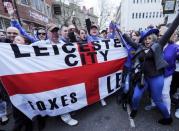 Leicester City fans celebrate in the street after their team's away soccer match against Manchester United, outside Hogarth's pub in Leicester, Britain May 1, 2016 REUTERS/Eddie Keogh