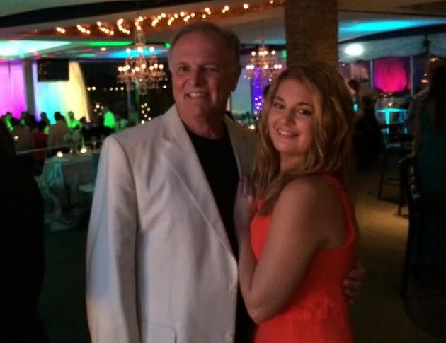 The author and her father at a wedding in summer 2014, three months after he was diagnosed with colon cancer. 