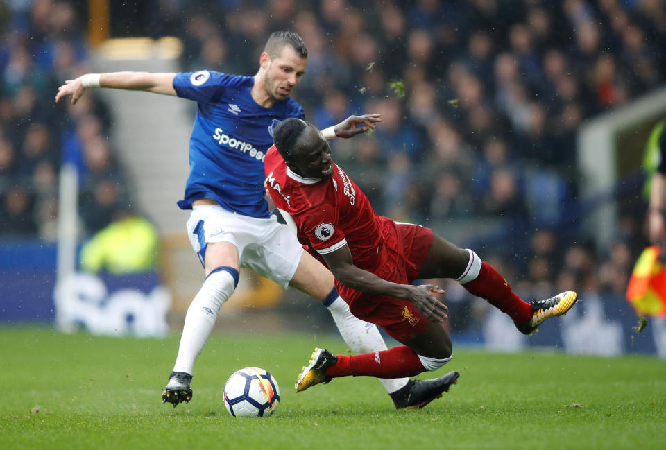 <p>Liverpool’s Sadio Mane feels the presence of Everton’s Morgan Schneiderlin </p>
