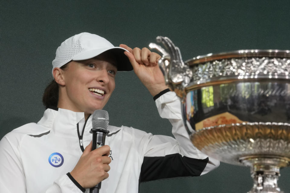 Defending champion Poland's Iga Swiatek attends the French Open tennis tournament draw at the Roland Garros Stadium, Thursday, May 25, 2023 in Paris. Play begins at the French Open on Sunday, May 28, 2023 and runs until Sunday June 11, 2023. (AP Photo/Thibault Camus)