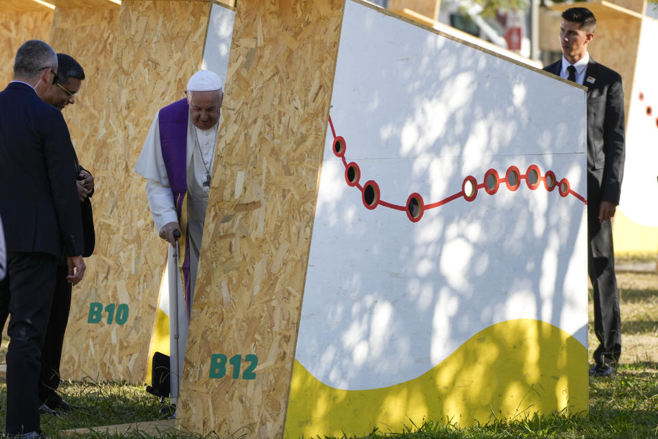 Pope Francis arrives to listen to the confessions of young people attending Sunday the 37th World Youth Day in Lisbon, Friday, Aug. 4, 2023. Francis is in Portugal through the weekend to preside over the jamboree that St. John Paul II launched in the 1980s to encourage young Catholics in their faith. The Argentine Jesuit has picked up John Paul's mantle with gusto as he seeks to inspire the next generation to rally behind his critical social justice and environmental priorities.(AP Photo/Gregorio Borgia)