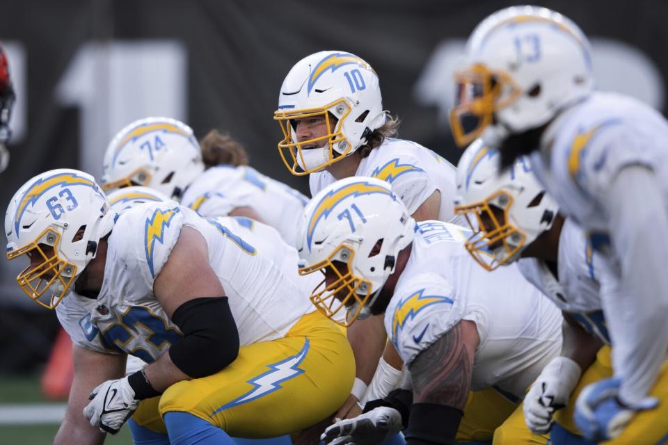 Chargers quarterback Justin Herbert readies to the receive the snap against the Cincinnati Bengals on Dec. 5.