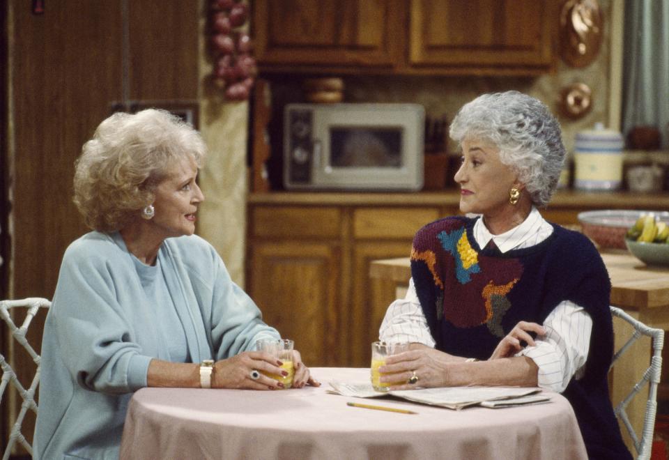 Betty White as Rose Nylund (L) Bea Arthur as Dorothy Petrillo Zbornak (R) on The Golden Girls. (Photo: Alice S. Hall/NBCU Photo Bank) 