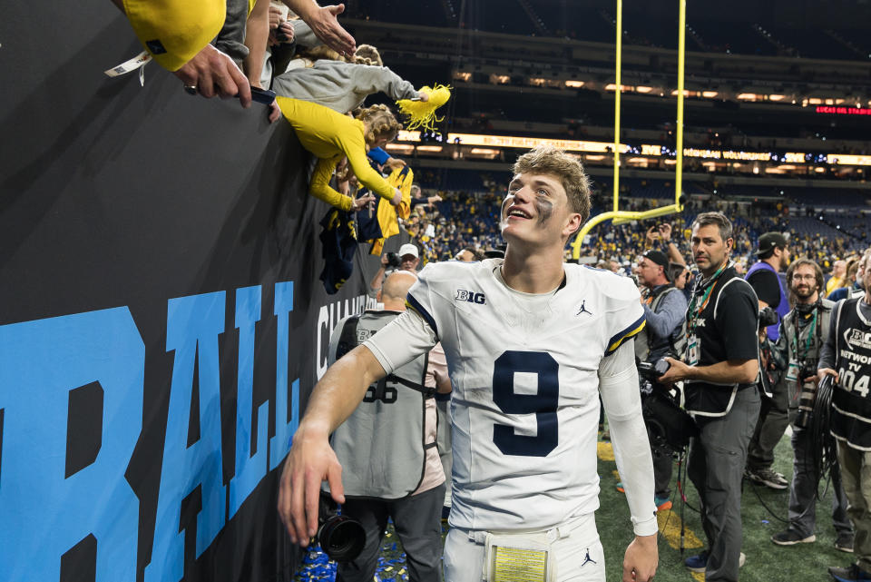 INDIANAPOLIS, IN - DECEMBER 02: Michigan Wolverines quarterback J.J. McCarthy (9) celebrates after the Big 10 Championship game between the Michigan Wolverines and Iowa Hawkeyes on December 2, 2023, at Lucas Oil Stadium in Indianapolis, IN. (Photo by Zach Bolinger/Icon Sportswire via Getty Images)