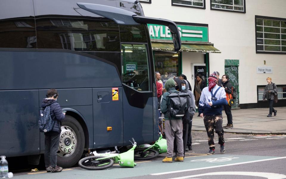 Bikes placed underneath the bus