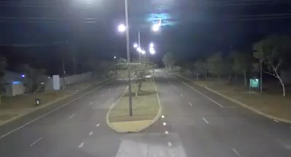 CCTV vision shows a mysterious flash of blue light in the sky above Alice Springs.
