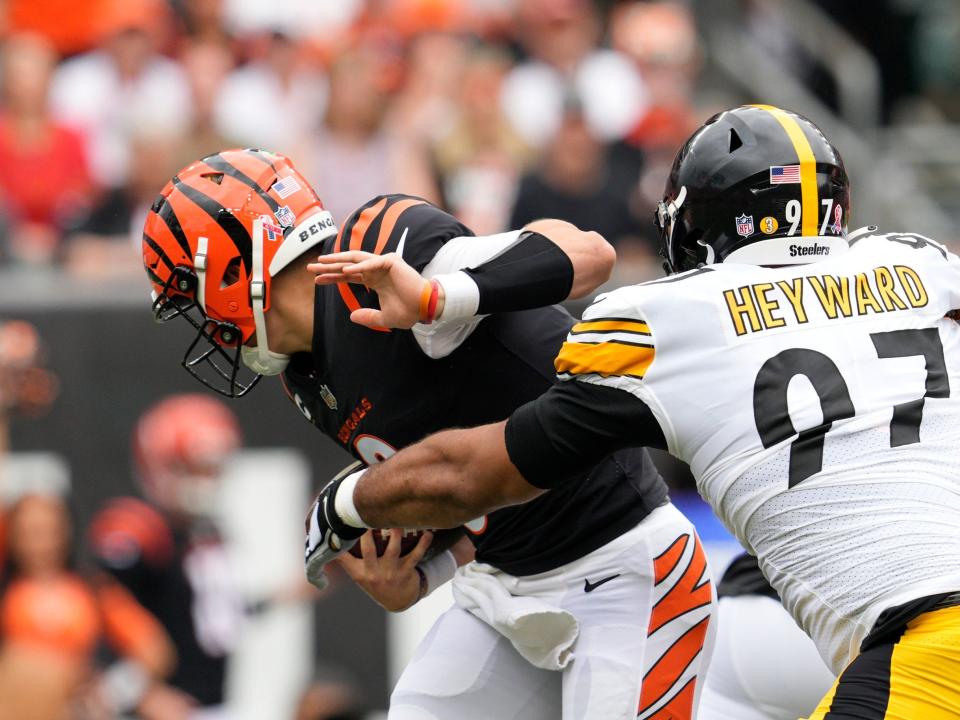 Joe Burrow is sacked by Pittsburgh Steelers defensive tackle Cameron Heyward.