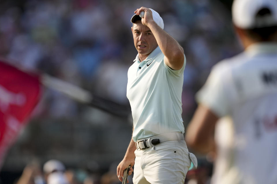 Rory McIlroy, of Northern Ireland, reacts after missing a putt on the 18th hole during the final round of the U.S. Open golf tournament Sunday, June 16, 2024, in Pinehurst, N.C. (AP Photo/Matt York)