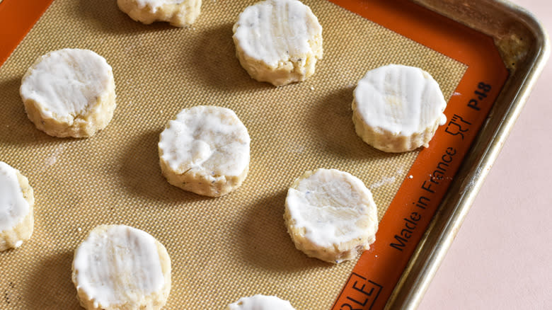 placing scones on baking sheet